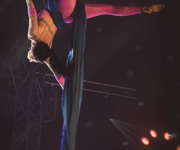 Athlete in a dynamic pose showing balance and strength.